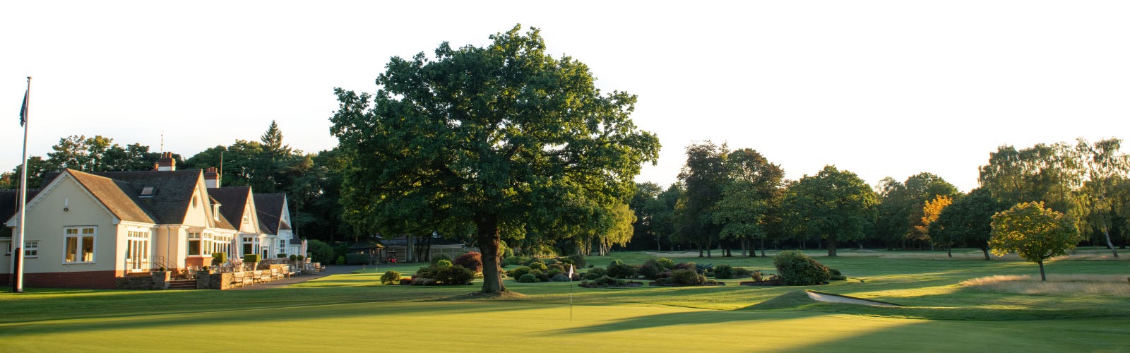 Evening light over the 18th green and clubhouse