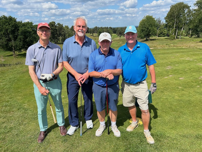 A four-ball ready to go on the heathland turf